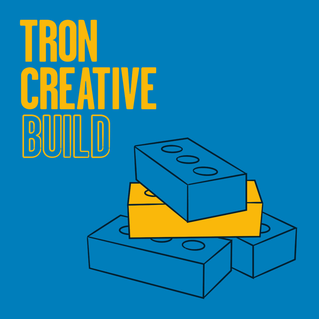 Tron Creative Build text alongside a pile of bricks, with the middle brick in yellow and the rest in blue.