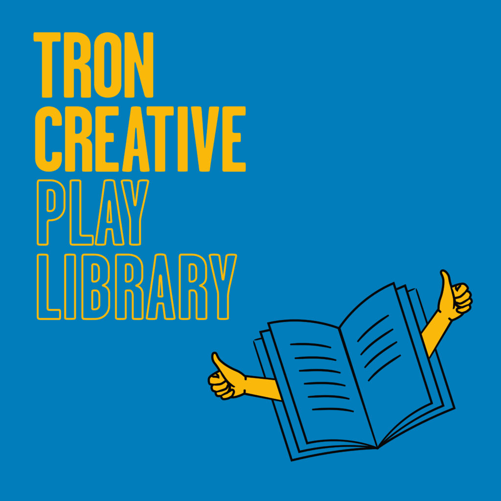 Play Library promotional visual in yellow text on a blue background. Text reads Tron Creative Play Library with a graphic illustration of a an open book with tiny arms giving the thumbs up signal alongside it. The book looks like it is flying.