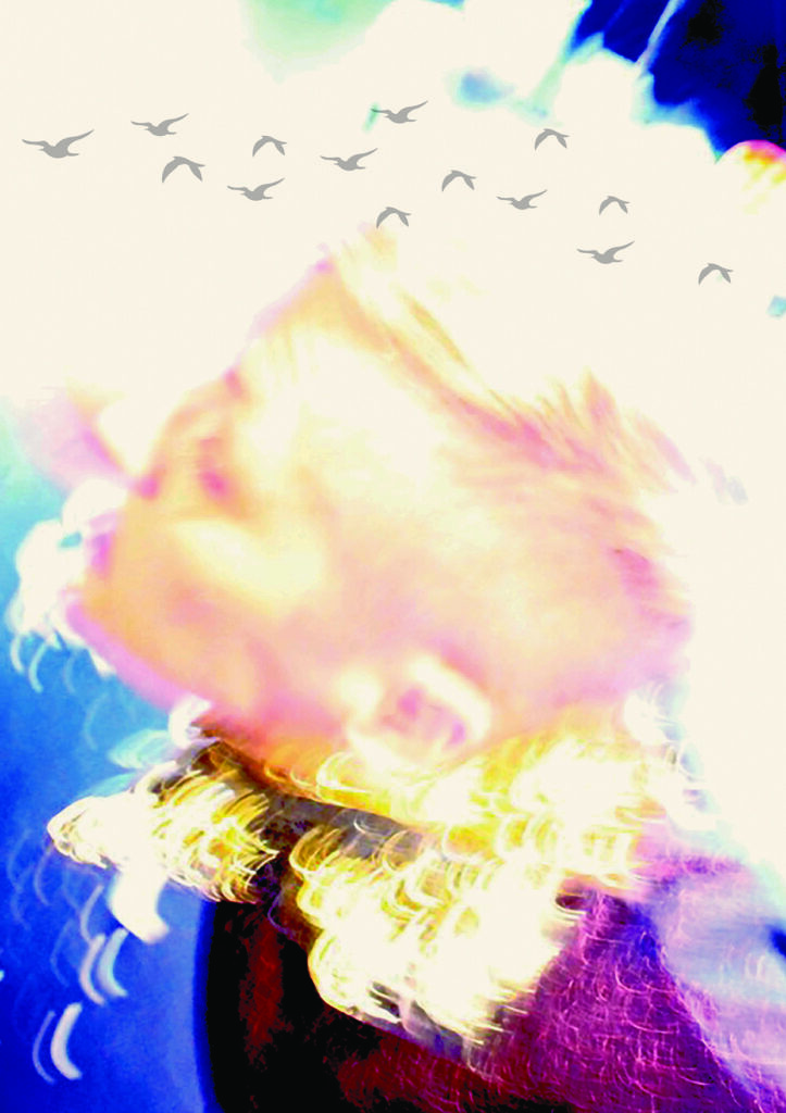 A distorted and solarized image of a blond cropped haired woman in motion. A flock of small grey birds fly above her head.